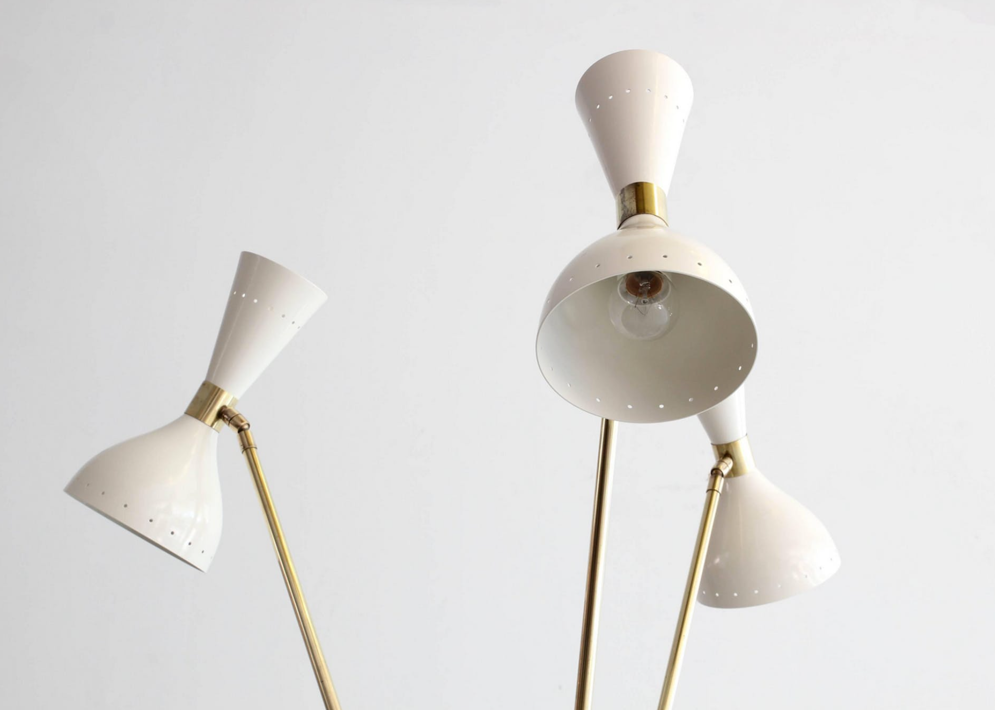 Tripod lamppost in the style of Italian creations