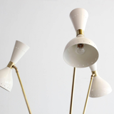 Tripod lamppost in the style of Italian creations