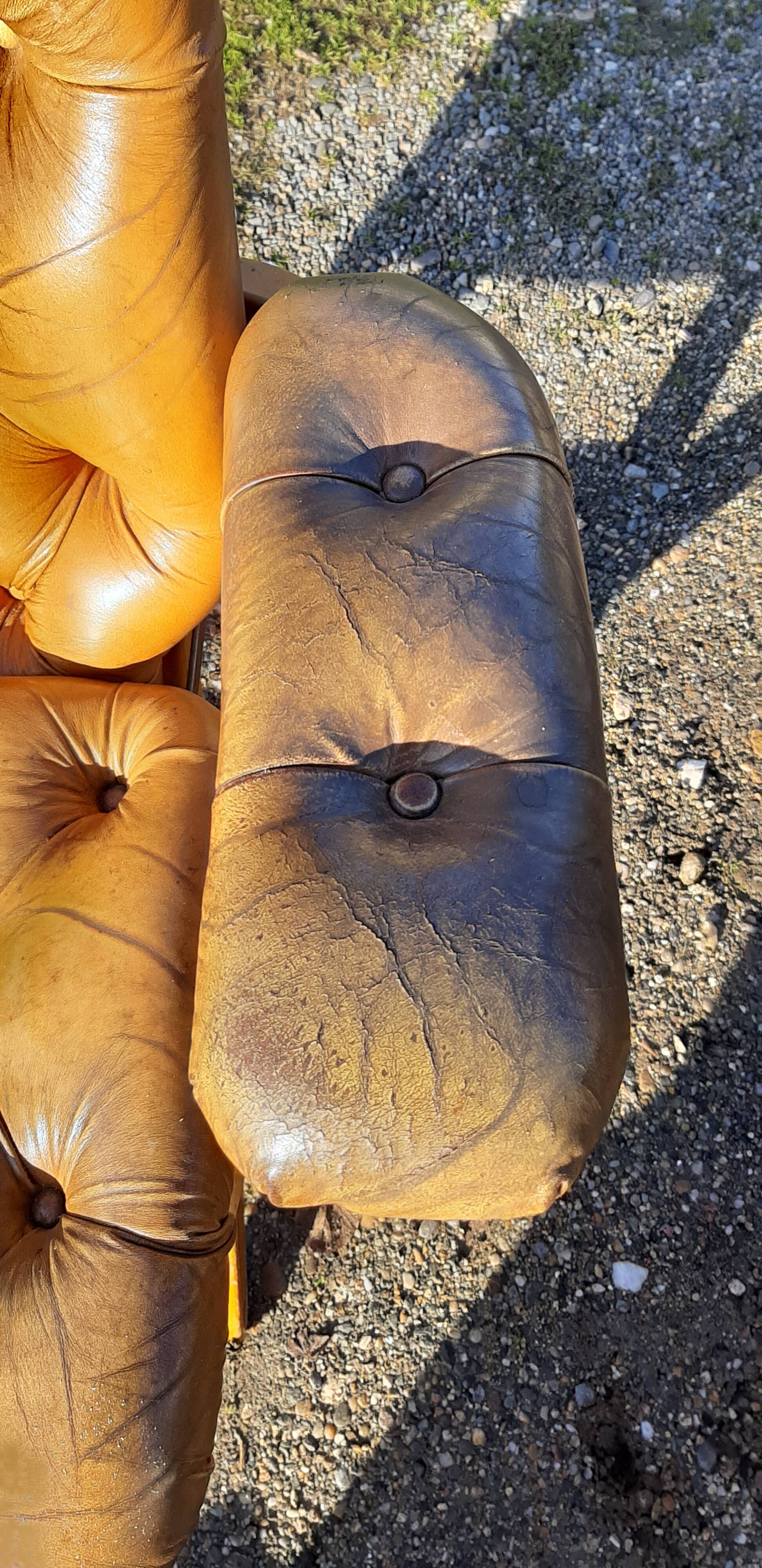 Pair of chesterfield style leather armchairs