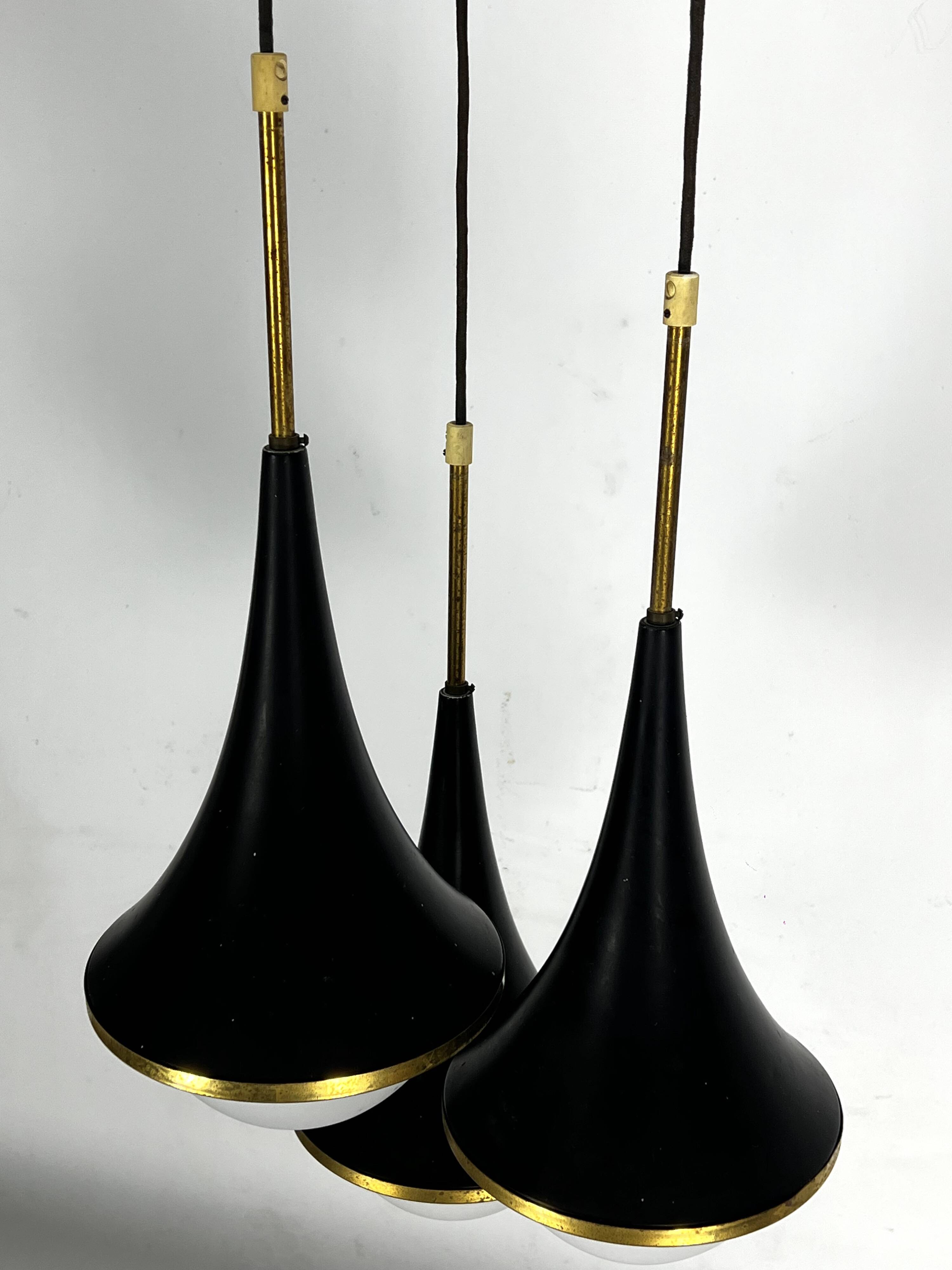 Mis-Century Stilnovo style pendant with three lights. Italy 1950s