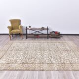 Tapis vintage à motifs floraux beige et marron