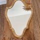 Miroir en bois doré