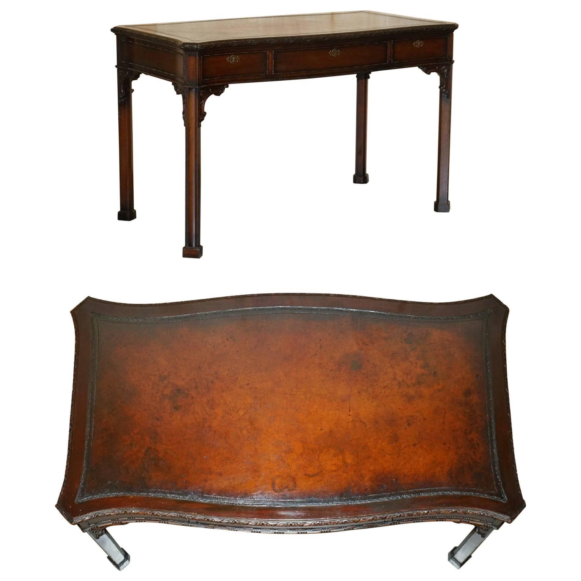 WARING & GILLOW library desk in the style of Thomas Chippendale with a leather top.