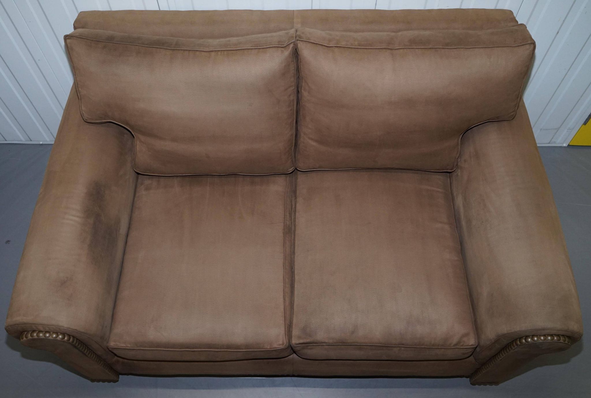Ralph Lauren Jamaica velvet sofa pair with feather cushions.
