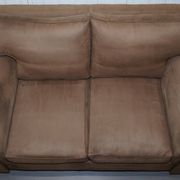 Ralph Lauren Jamaica velvet sofa pair with feather cushions.
