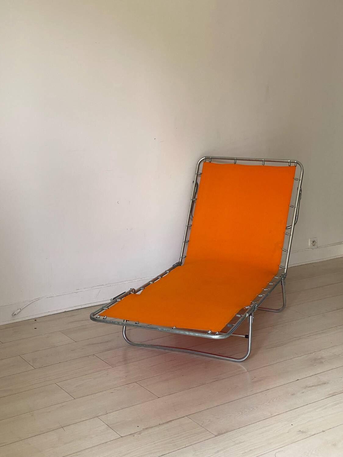 Orange and metal deckchair 1970