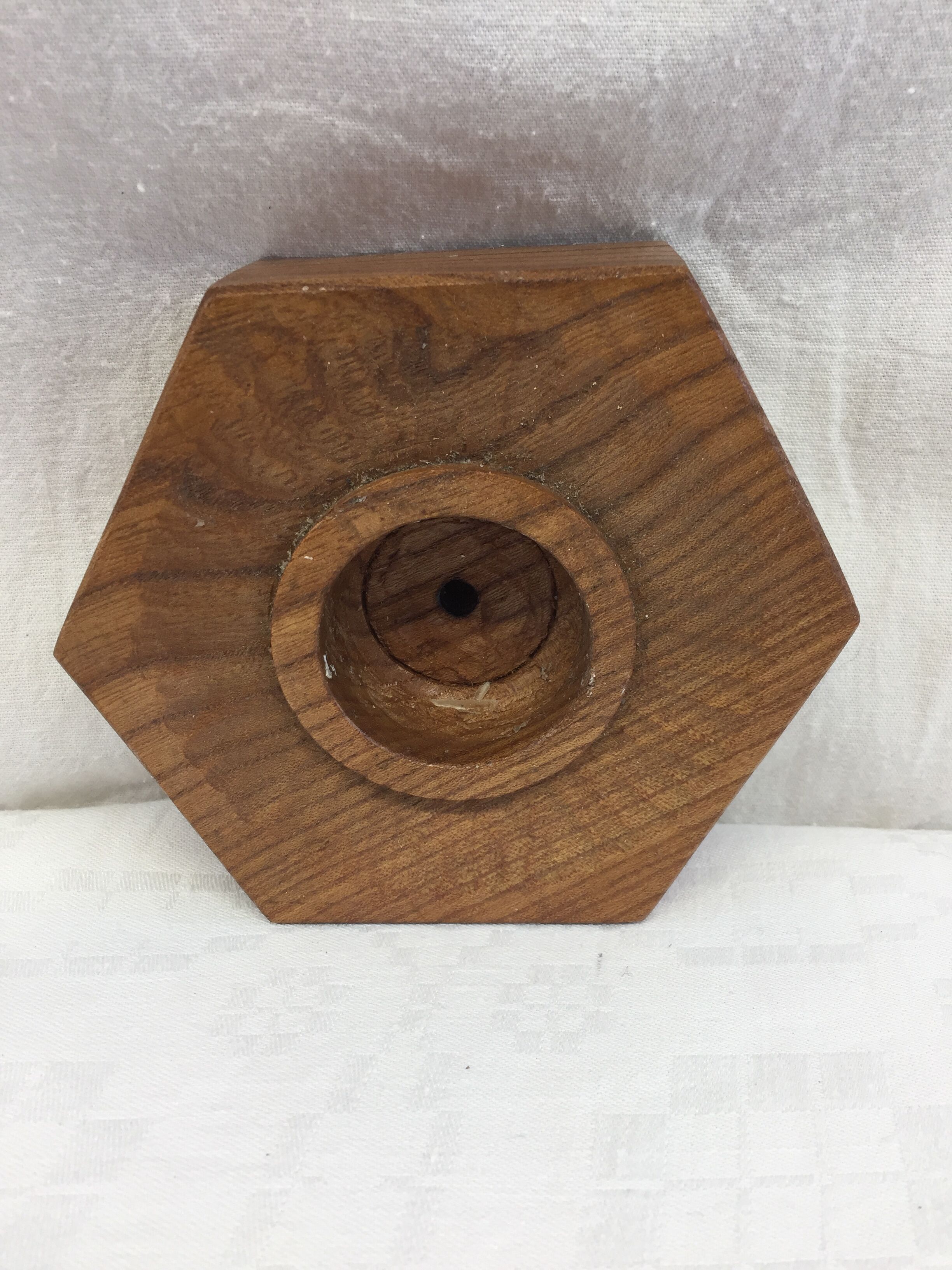 Handmade natural wood candle holder, hexagonal shape and its 3 old beeswax candles.