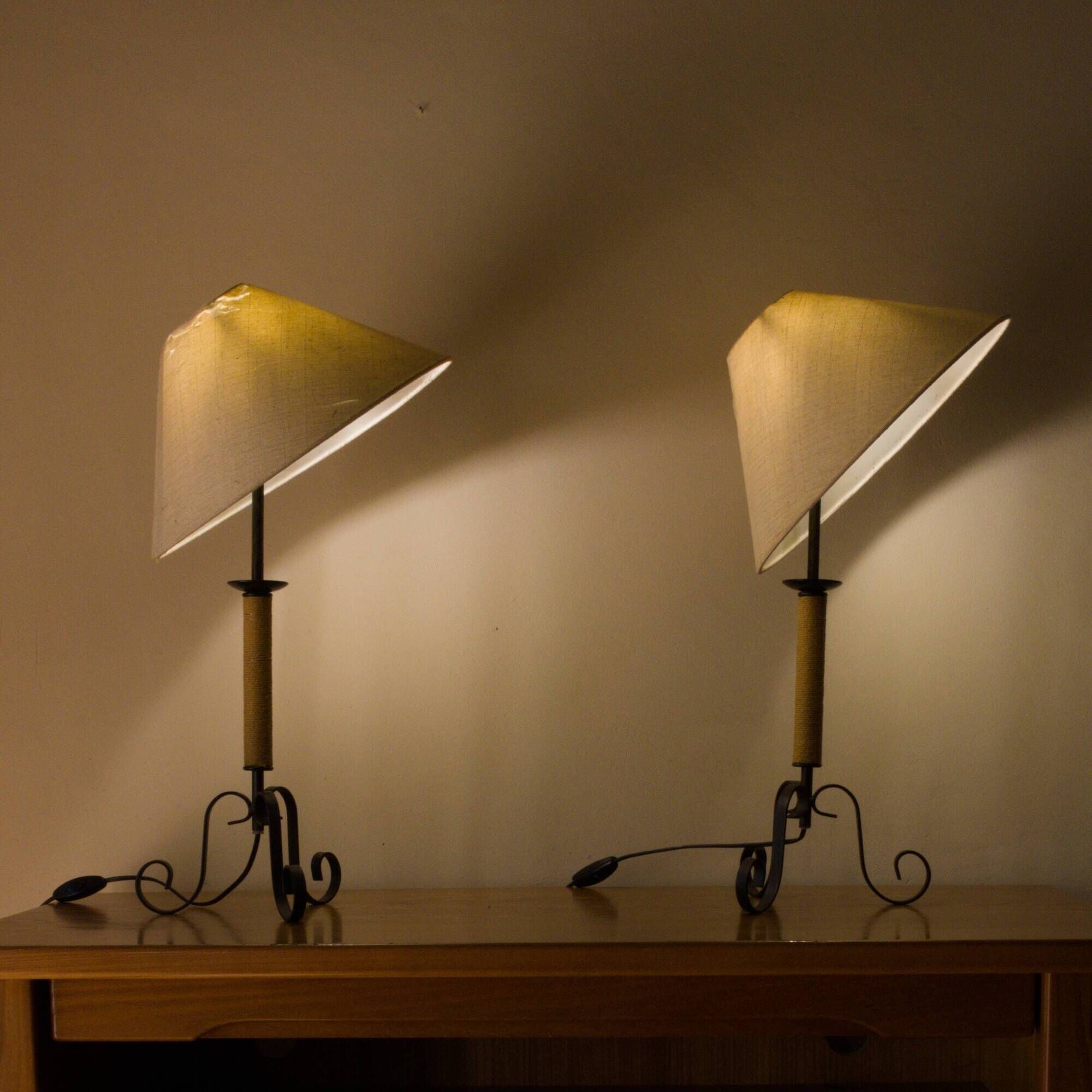 Pair of wrought iron and rope table lamps, adjustable lampshade.