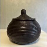 Dark purple wicker and leather round basket