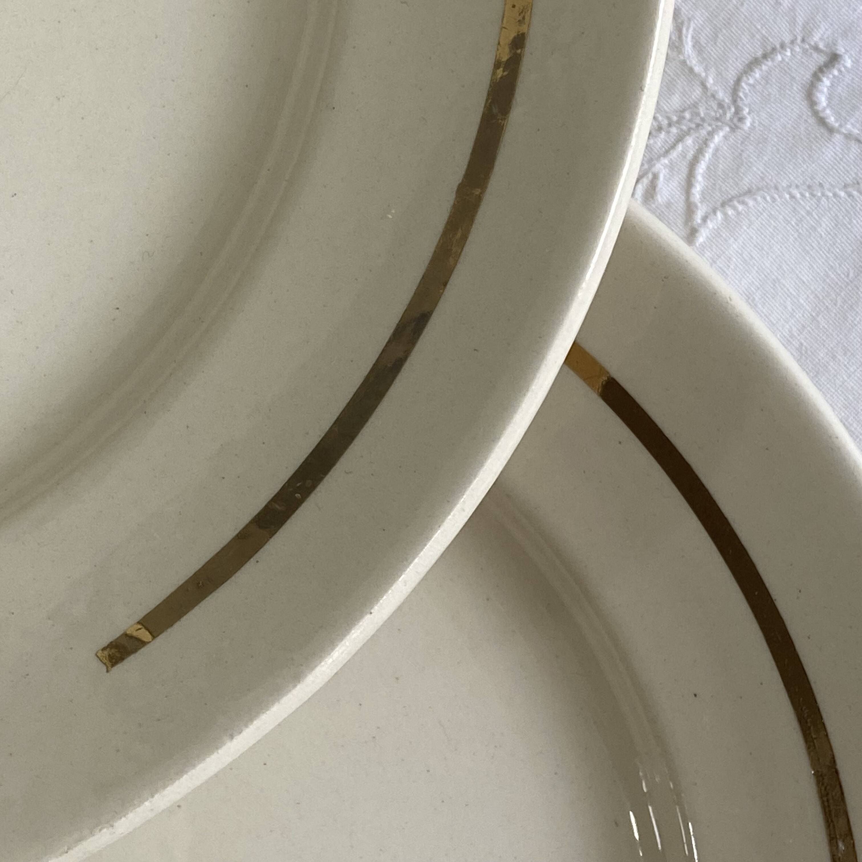 6 antique Badonviller faience dessert plates with flowers and gilding.