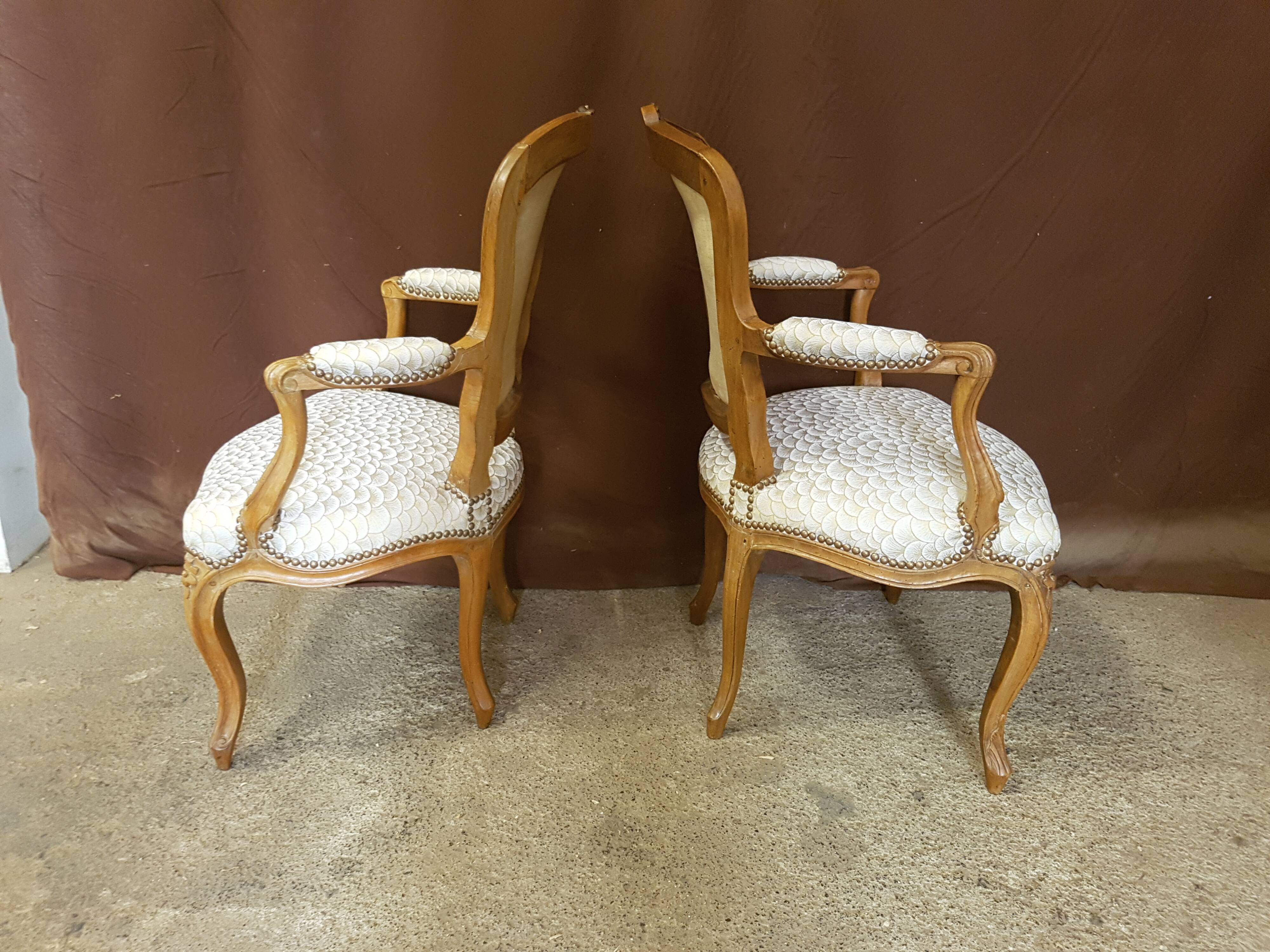 Pair of Louis XV-era convertible armchairs