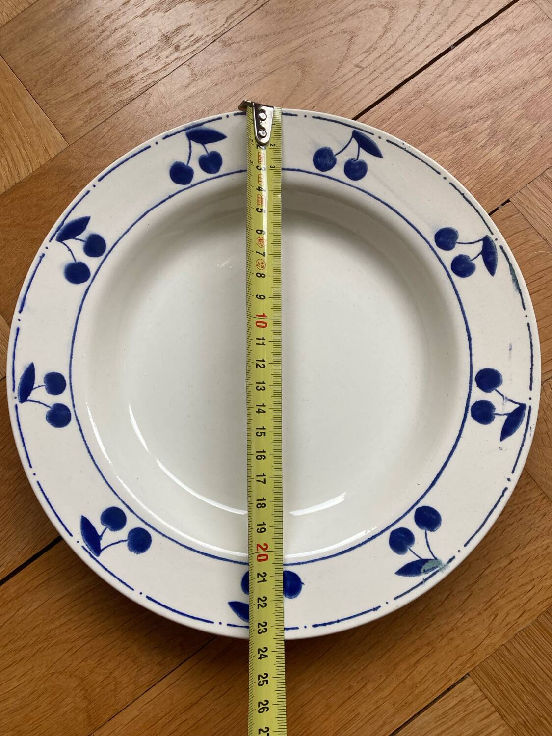 Fruit bowl decorated with blue cherries