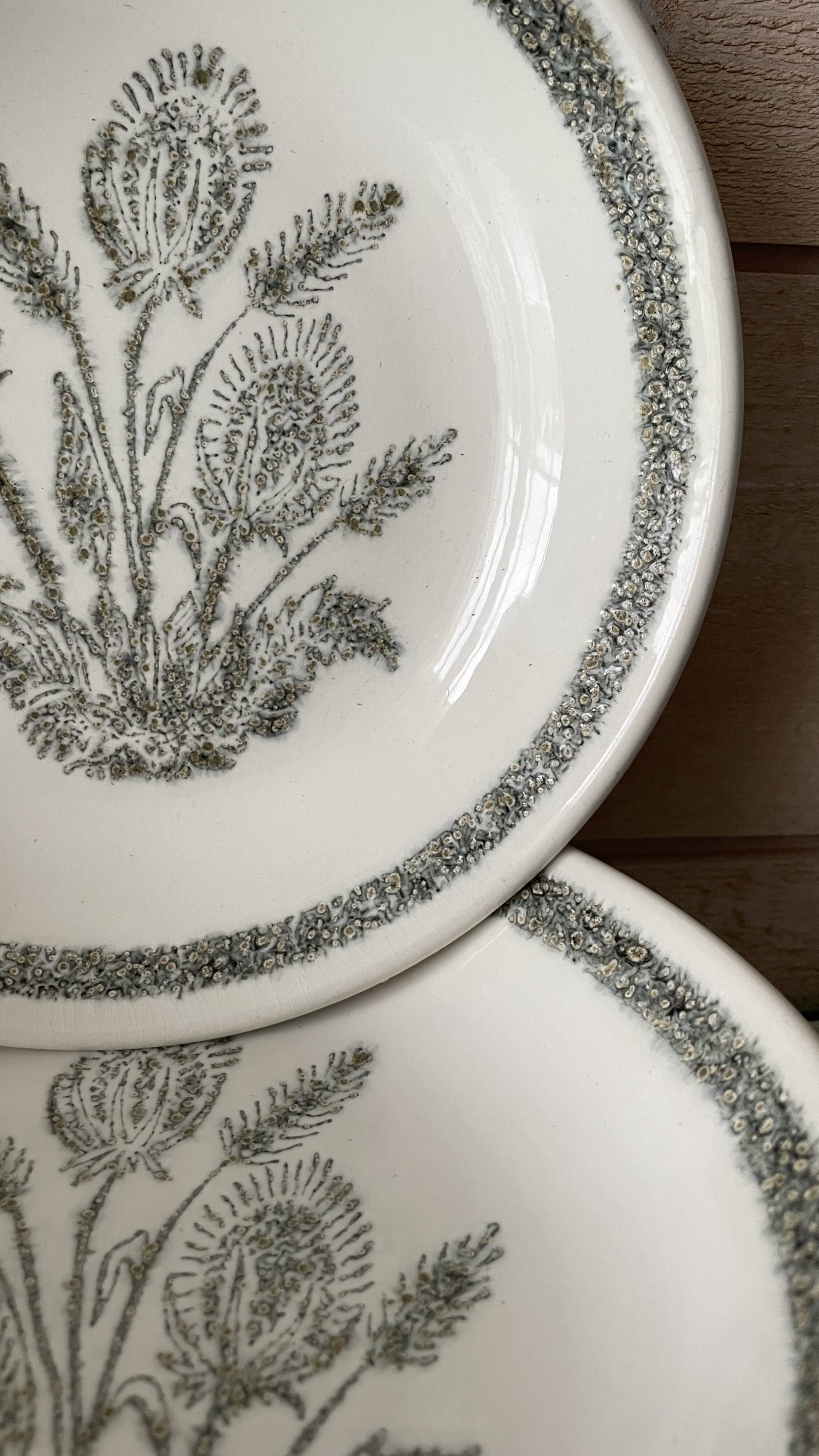 Set of 6 soup plates with thistles