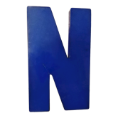 Letter N of vintage sign in blue plexiglass