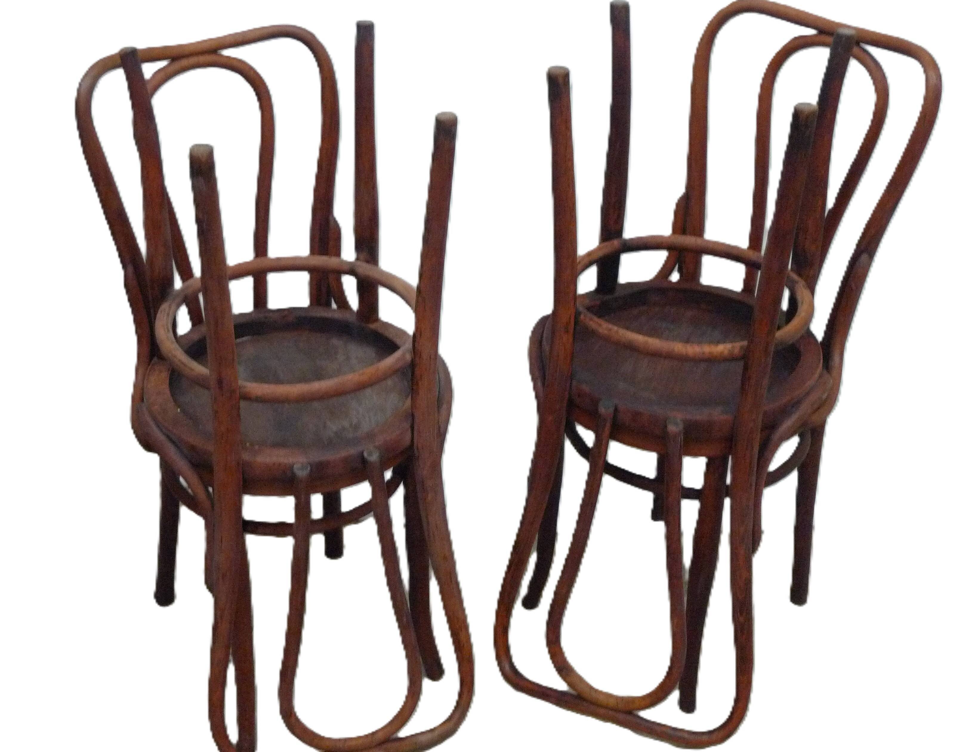 Set of four Jacob Kohn chairs.