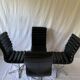 A set of four leather chairs, Italy, 80s
