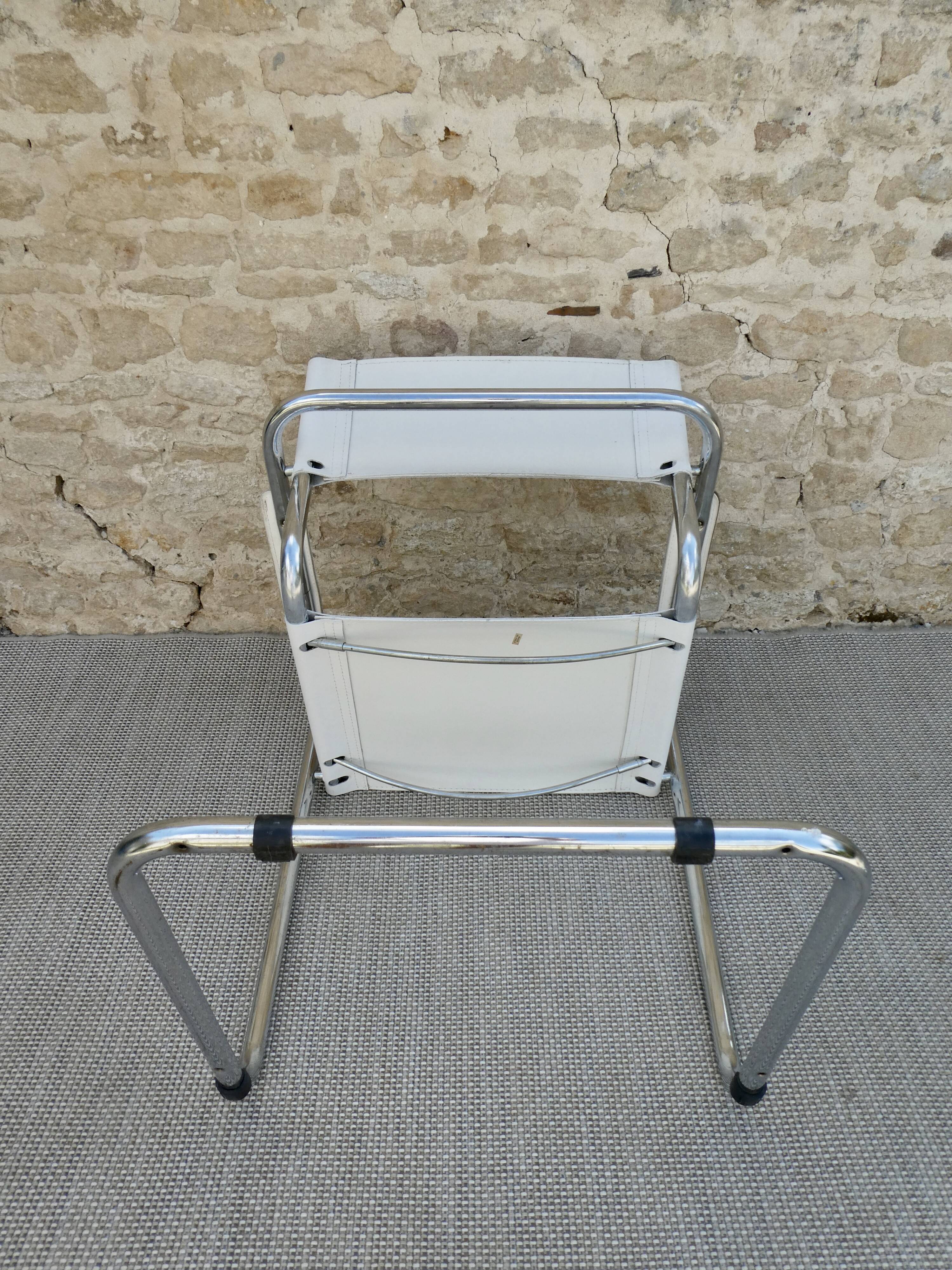 Armchair in chrome and leather