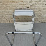 Armchair in chrome and leather