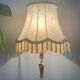 Empire / Directoire living room lamp in gilded bronze, mid-20th century