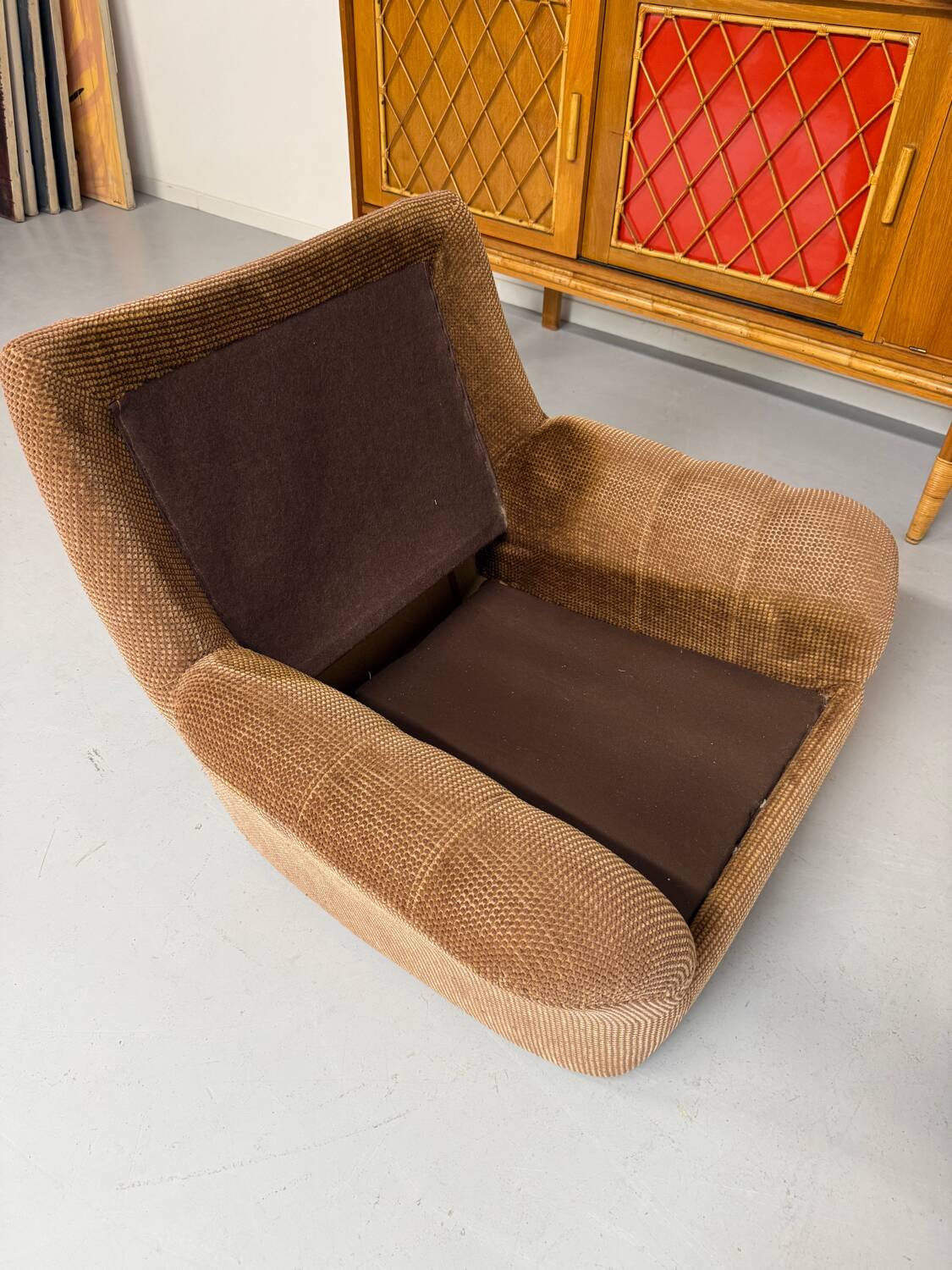 Old vintage 60s fabric lounge chair