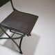 Foldable chair in wrought iron and leather. c. 1950