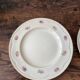 Two identical vintage Clarice Cliff plates from the Newport Pottery.