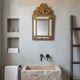 Antique French mirror in repoussé brass with a 19th-century pediment (60*34 cm)
