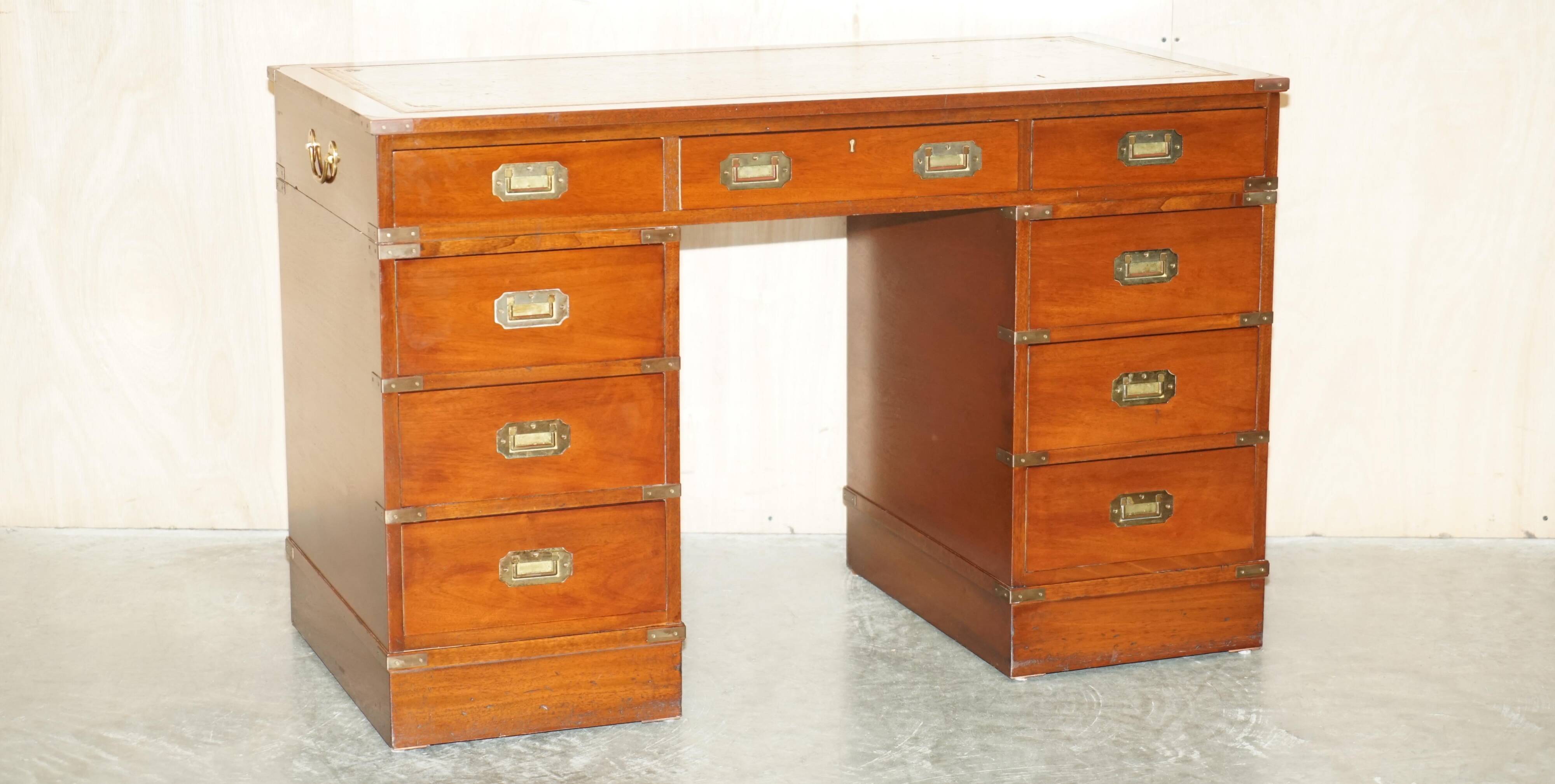 Vintage Harrods Kennedy desk in military campaign style with drawers.