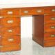 Vintage Harrods Kennedy desk in military campaign style with drawers.
