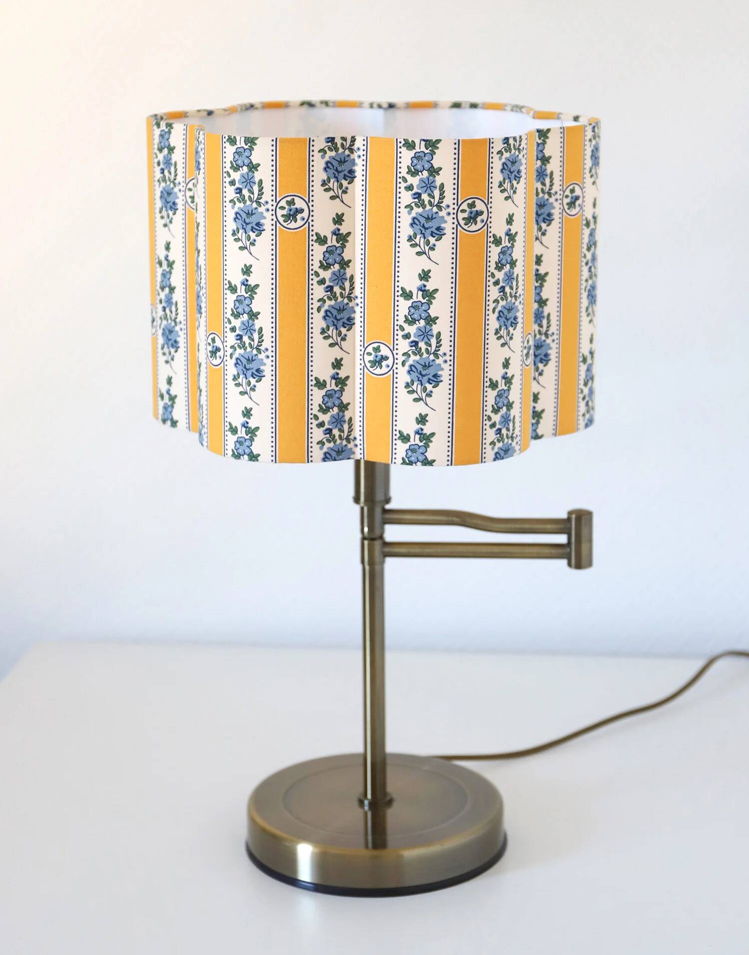 Recycled vintage lamp — with a swivel arm, fluted floral shade
