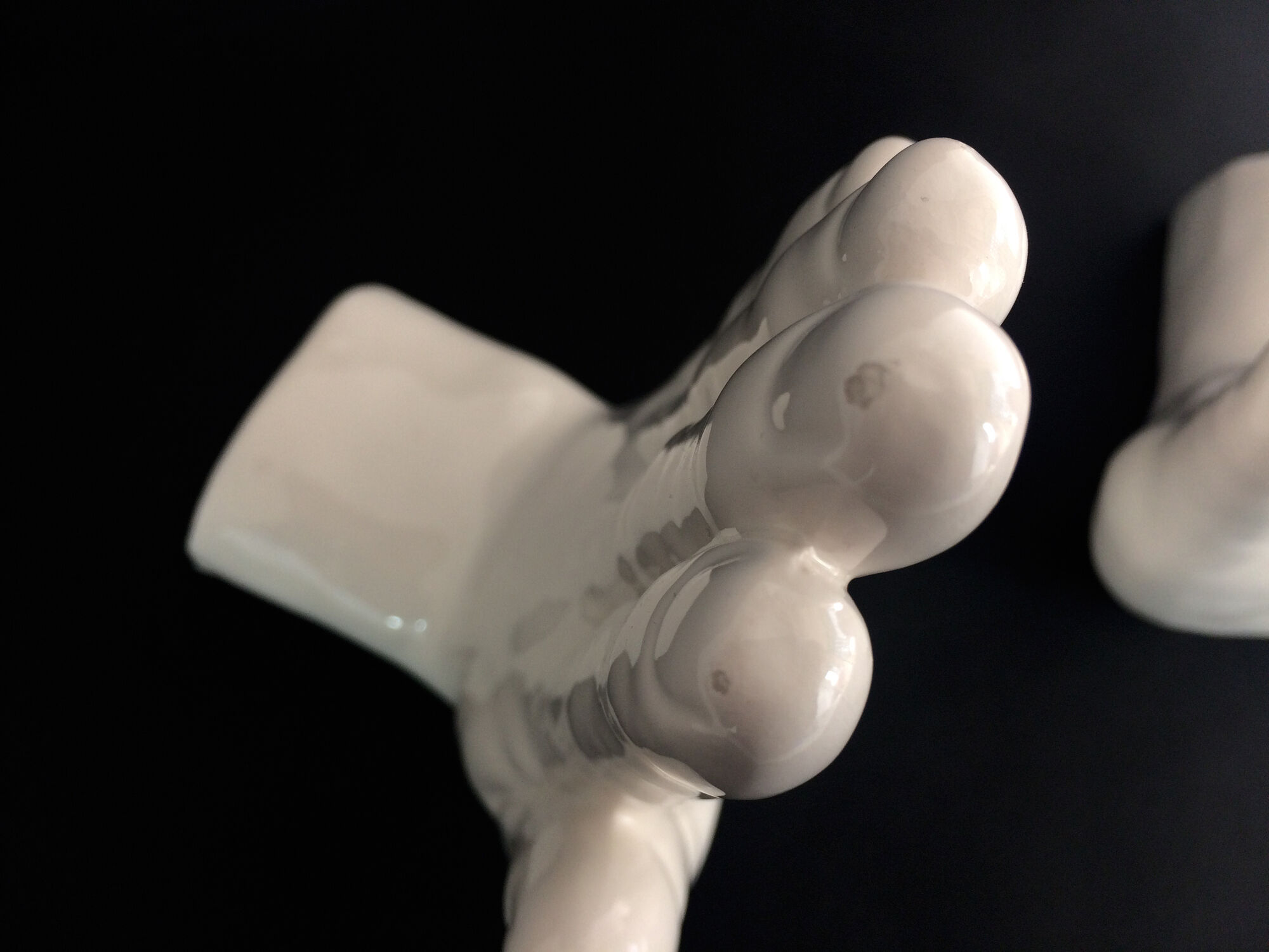 Pair of vintage handends in white ceramic to be used to comfort. Year 80