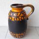 Vase en céramique orange et marron