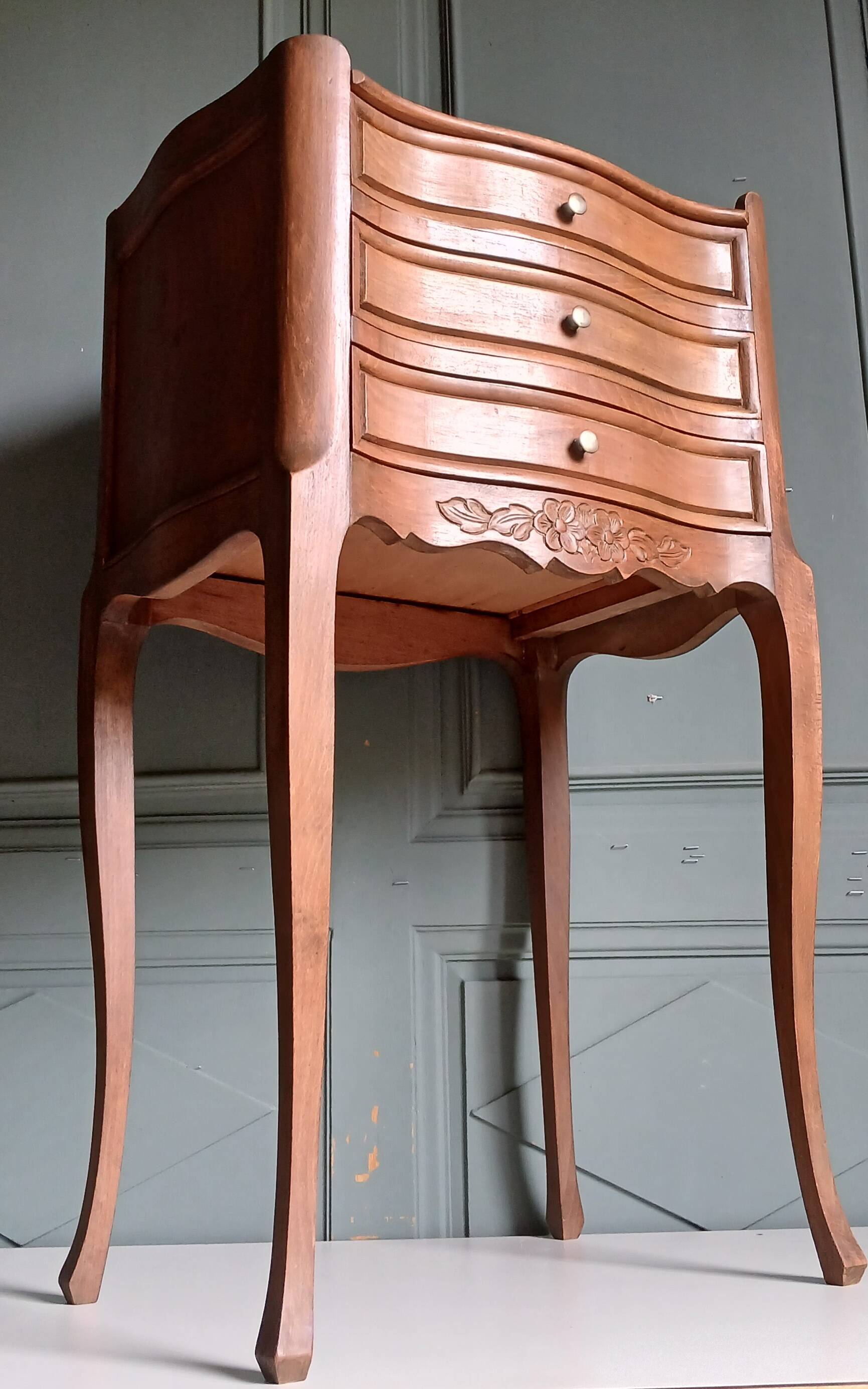 Curved fruitwood chiffonnier in Louis XV style.
