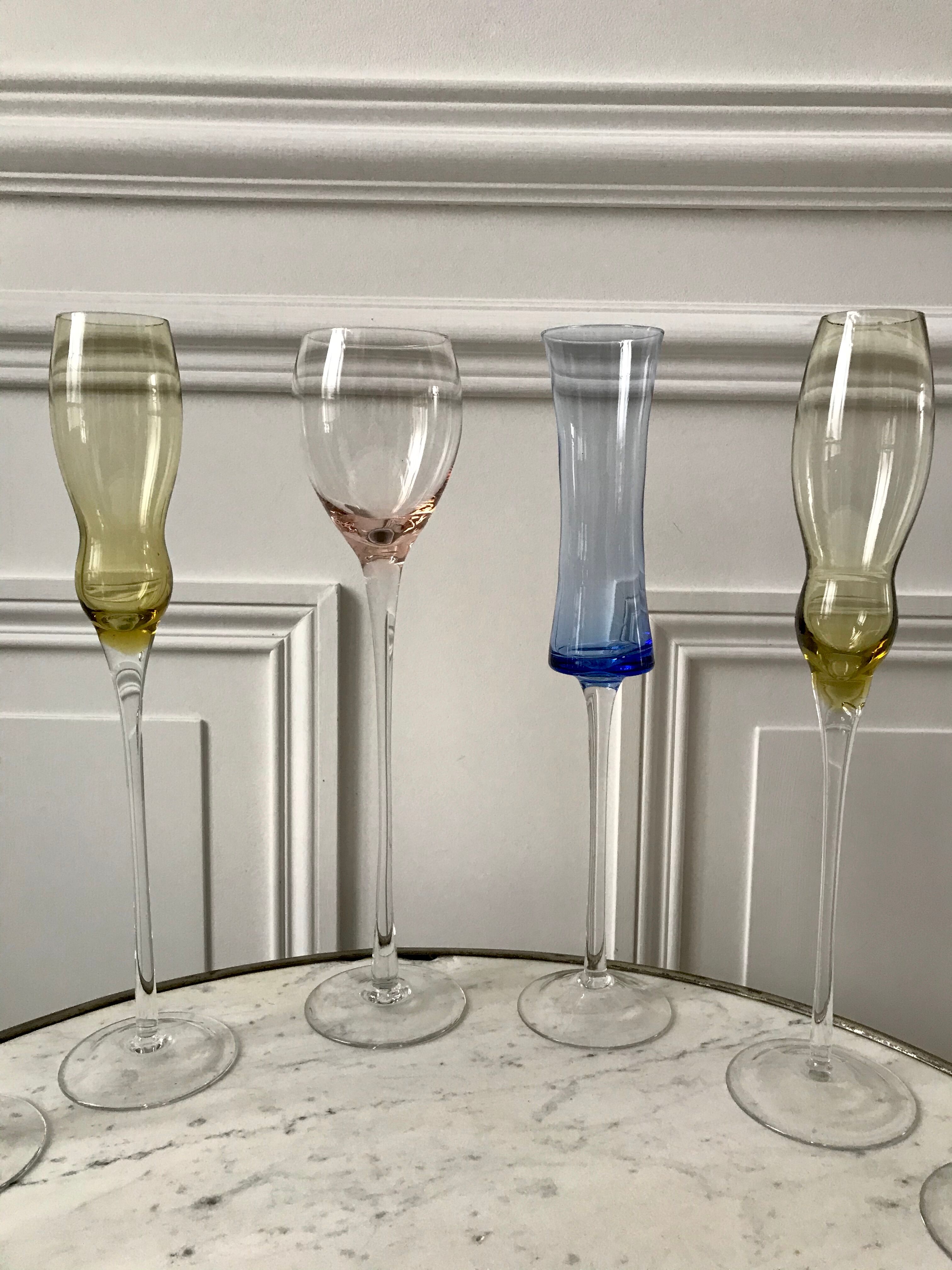 Set of 10 very high champagne flutes in colored glass 70s