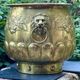 Large brass lion planter with a hallmark from the 19th century.