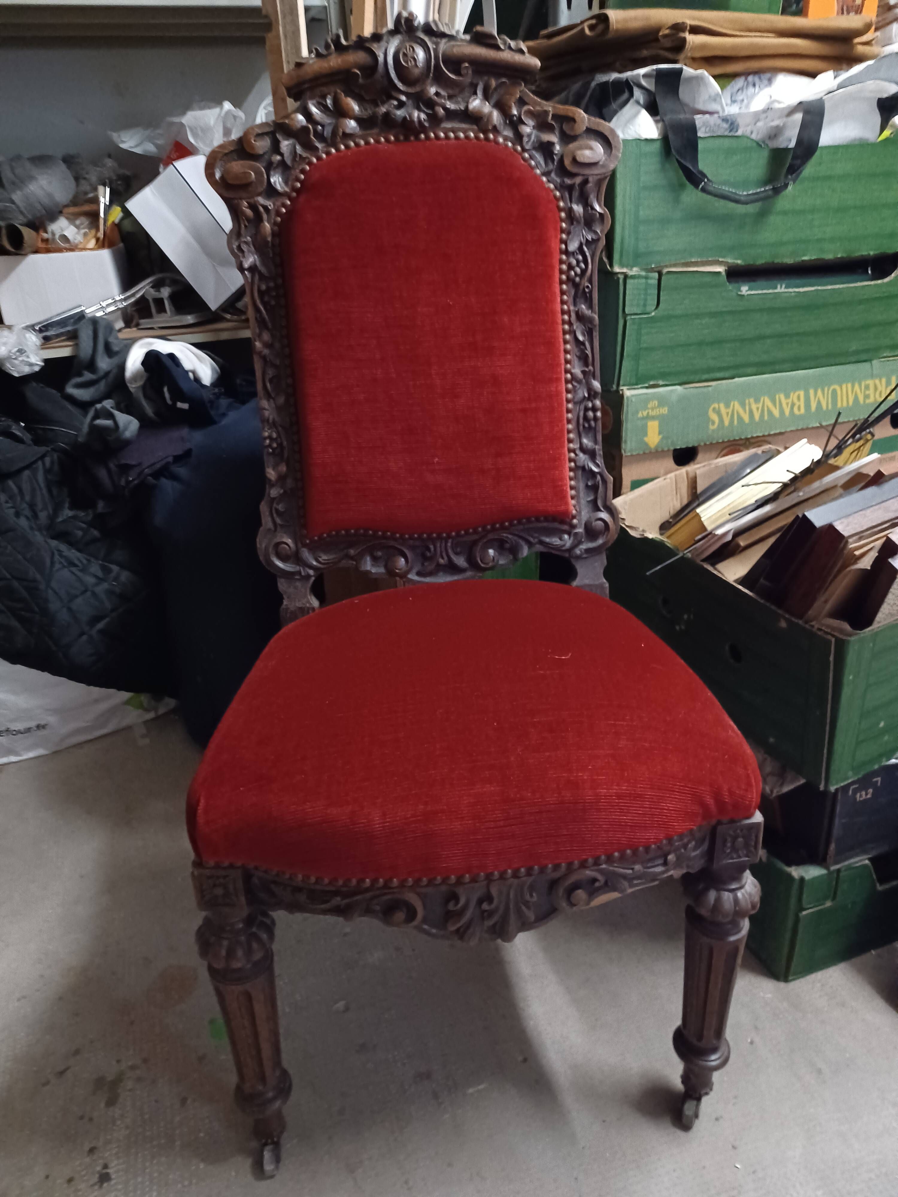 Baroque style chair in monogrammed wood and red velvet fabric