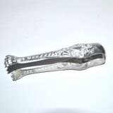 Rocaille sugar tongs in silver metal with lion claw medallion