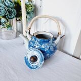 Handcrafted Japanese porcelain teapot hand painted in blue and white.