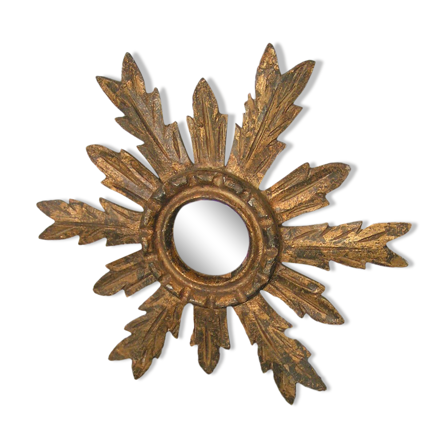 Sun mirror in gilded wood