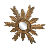 Sun mirror in gilded wood