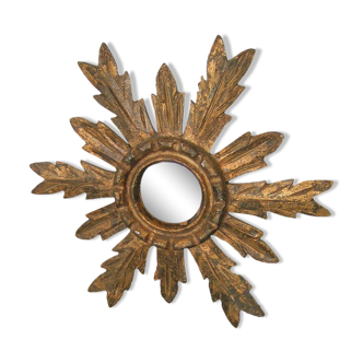 Sun mirror in gilded wood