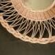 Vintage rattan sun mirror