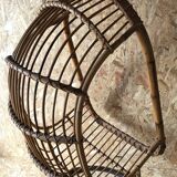 Vintage rattan hanging chair with its stand.