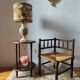 Old wooden turned spindle fireside chair with a straw seat.