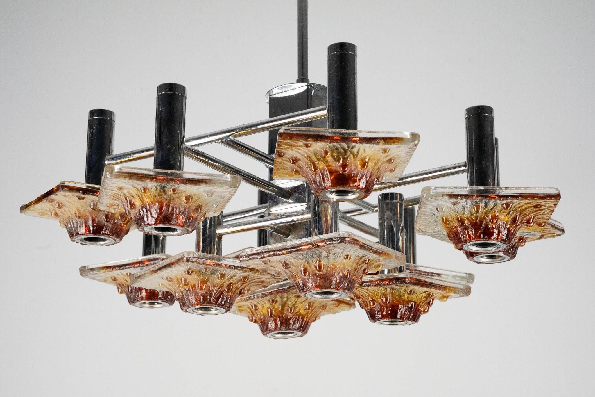 12-light Mazzega chandelier in amber and clear murano glass and chrome. Ita
