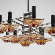 12-light Mazzega chandelier in amber and clear murano glass and chrome. Ita
