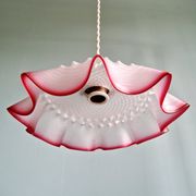 Pair of clear and pink satin glass scalloped pendant lights, 1920s-30s