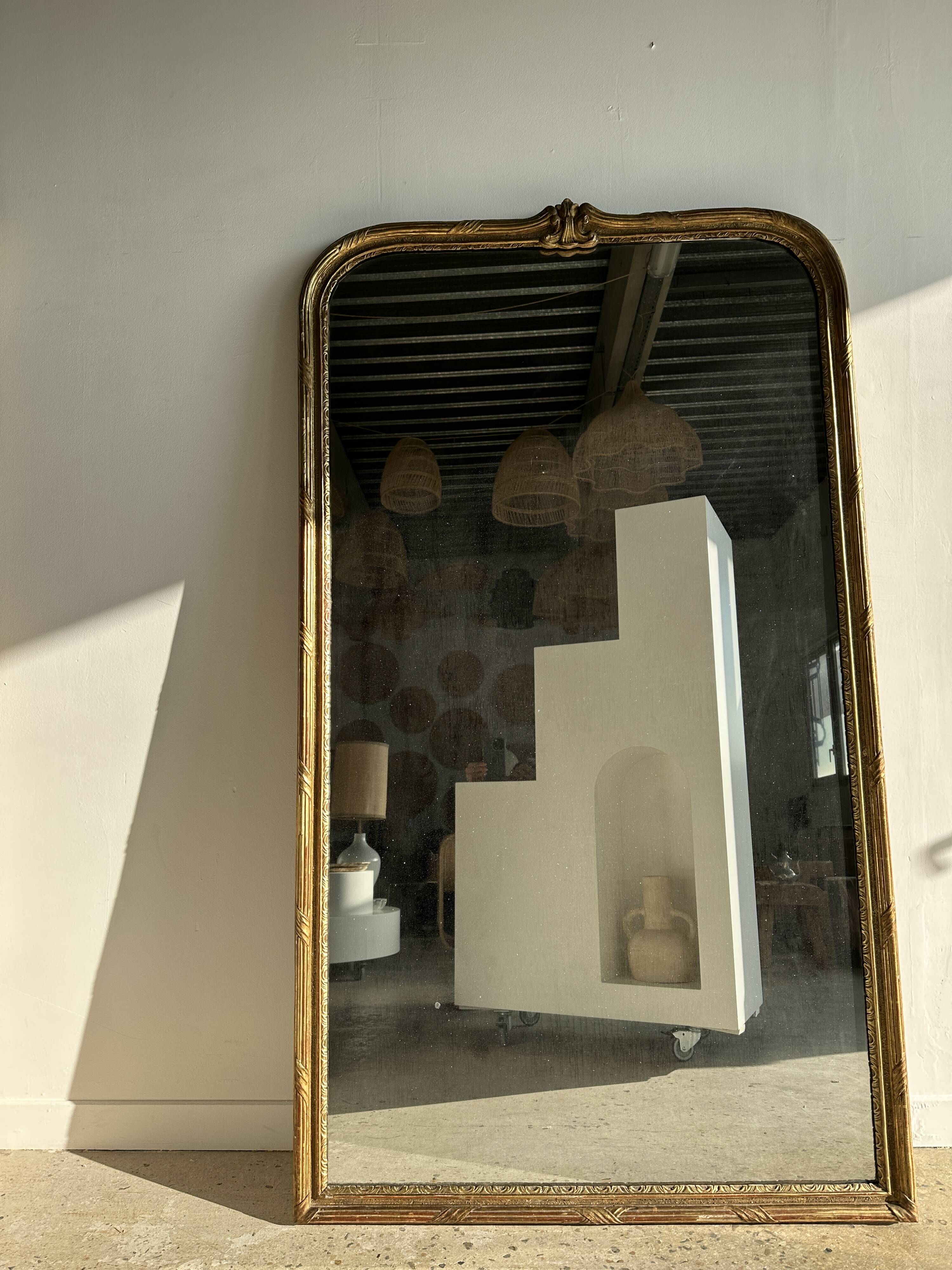 Large gilded mirror 19th century rounded corners mercury glass Louis XVI style