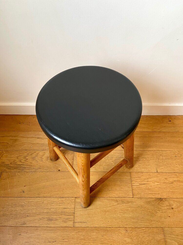 Light and black wooden stool