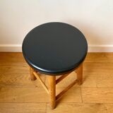 Light and black wooden stool